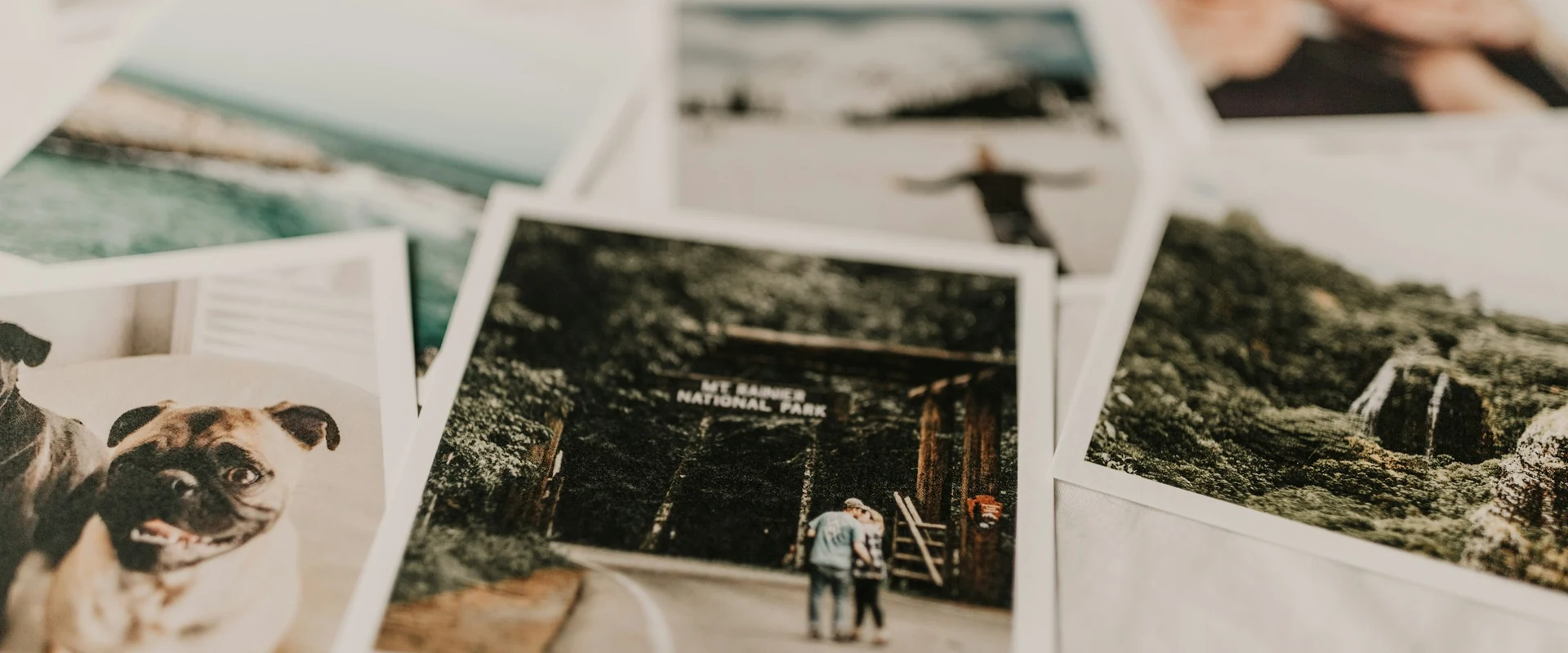 Photo prints scattered on a table