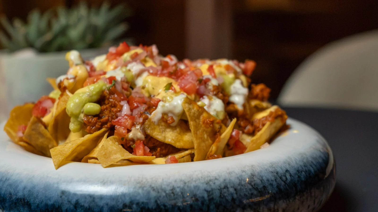 Nachos with chorizo, guacamole and pico de gallo