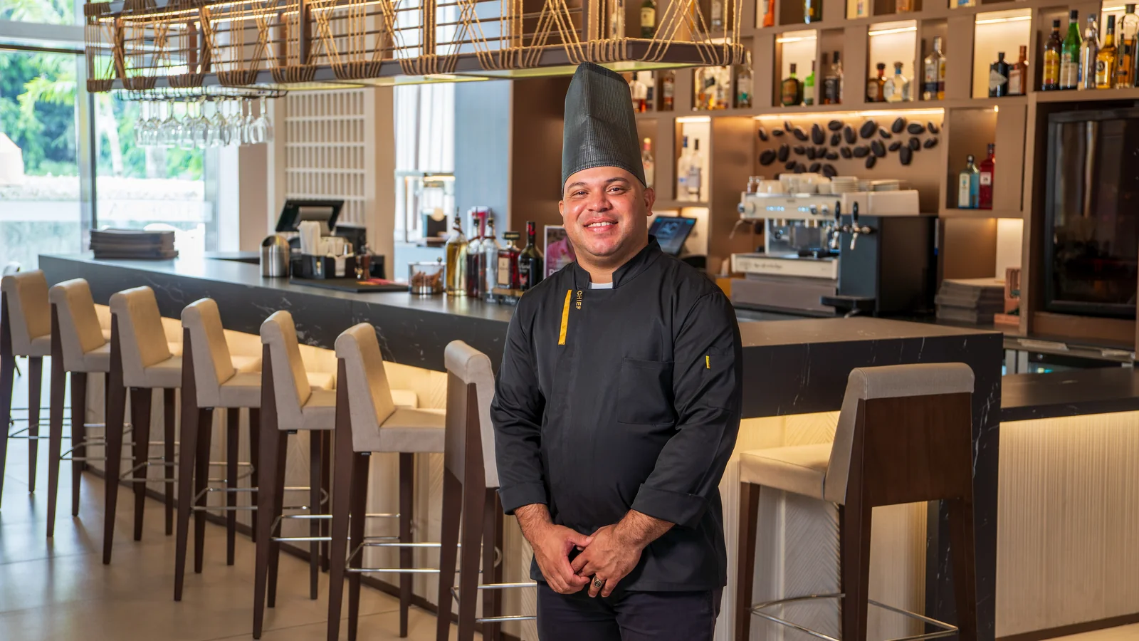 Chef at the bar, relaxed frame